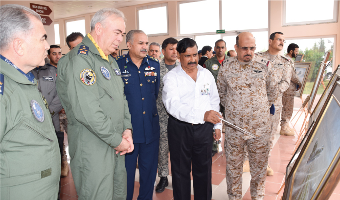 Participants are being briefed by the artist on PAF Combat History